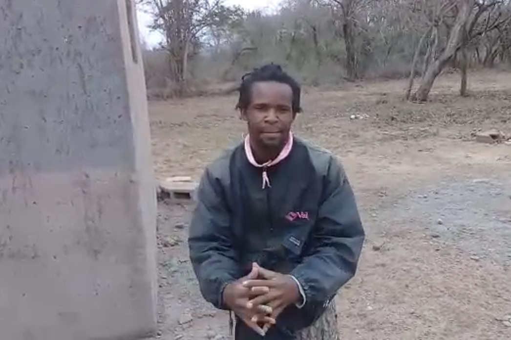 Young person Richard Sifundza  of Mnjoli building a tourist camp.