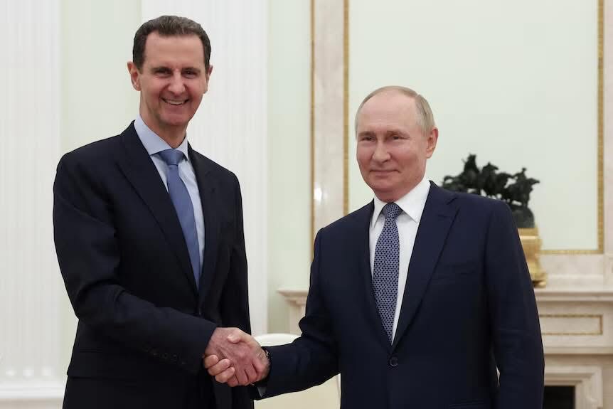 Syrian President Bashar al Assad runs to Russian President Putin after being overthrown by rebels.